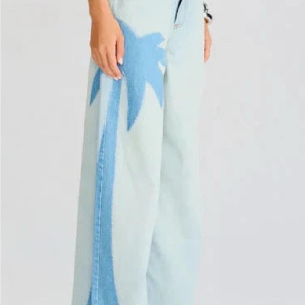 Retrofete Light Blue Flare Jeans with Palm Design